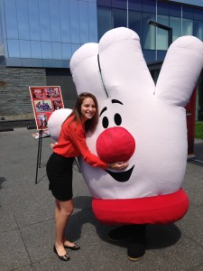 General Mills intern Stacy Hauersperger mugging with Hamburger Helper mascot