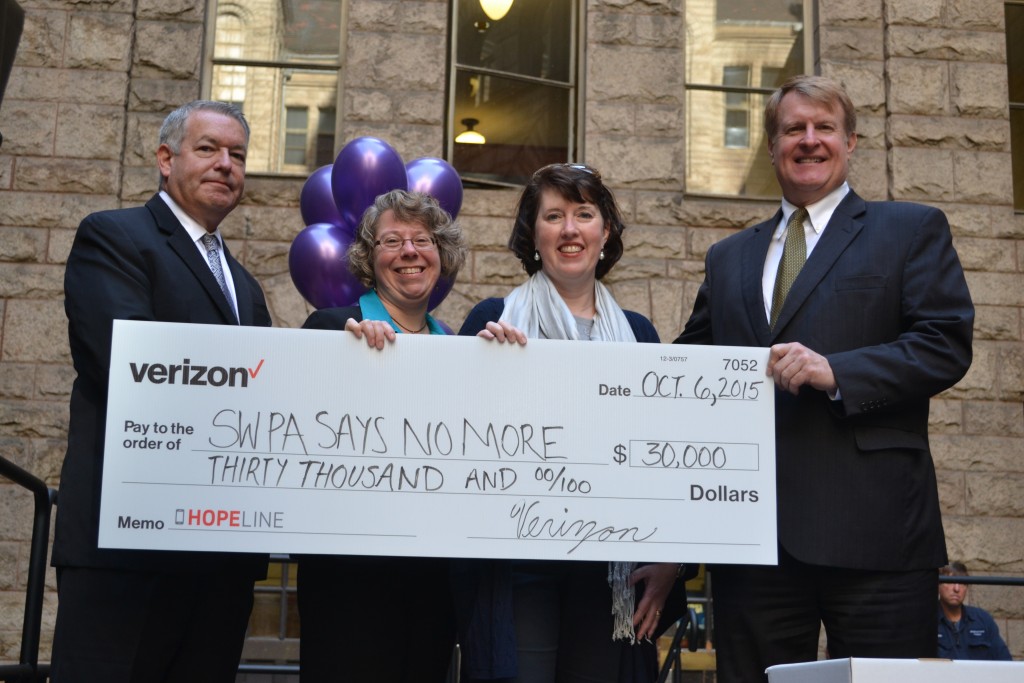 Verizon presents Southwest PA Says No More with a $30,000 grant at the Verizon HopeLine phone drive.