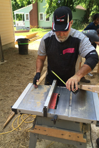Verizon employee volunteering for Habitat for Humanity