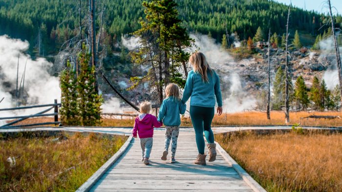 Chelsea Gillespie With Children In Yellowstone National Park | Become A Digital Nomad
