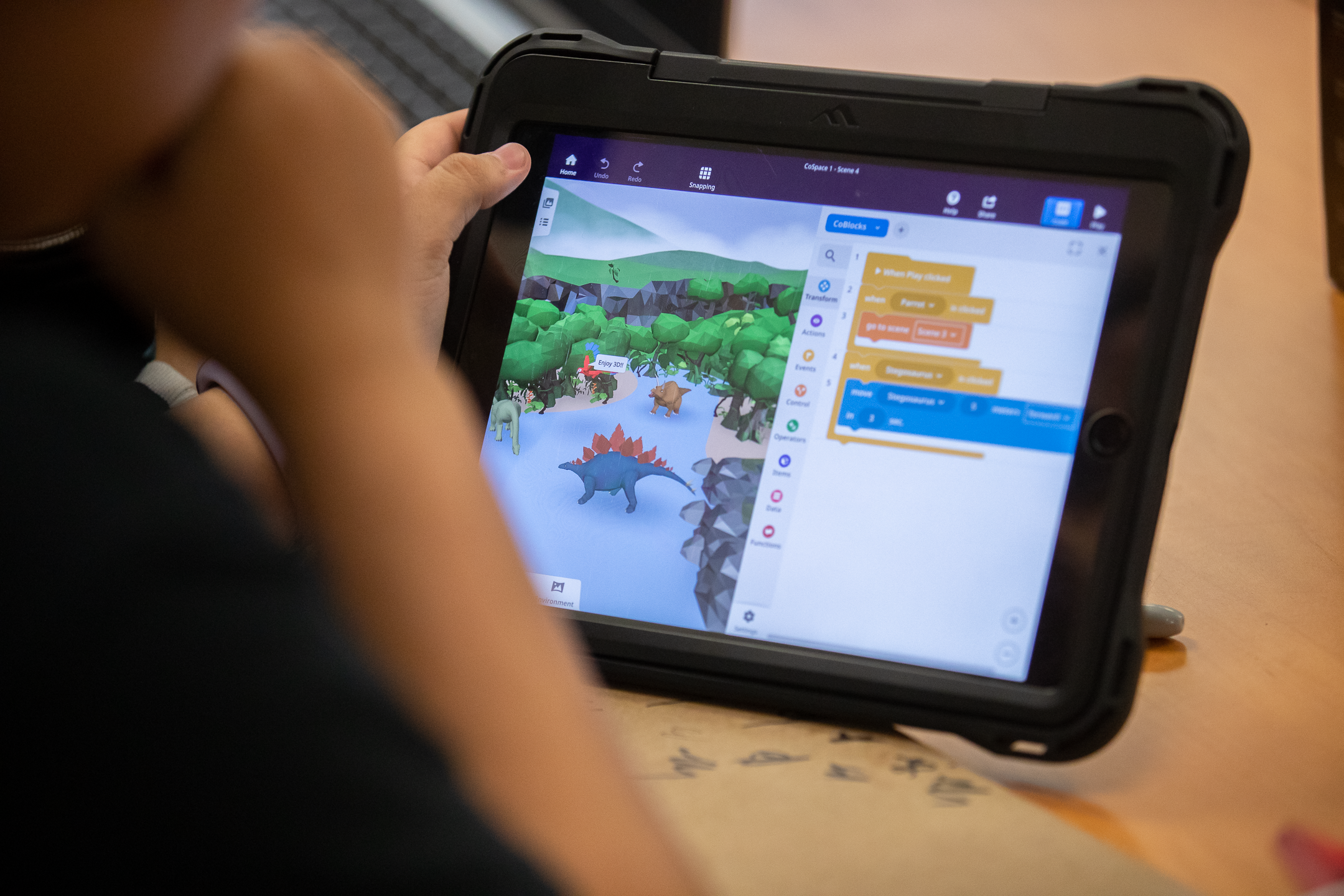 A Los Angeles middle school student tries his hand at coding and game design using his own area of interest: dinosaurs.