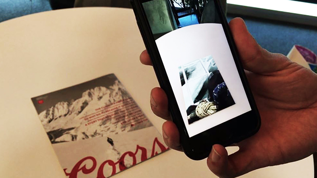 Readers hover their smartphone cameras over the cover of a recent Sports Illustrated magazine to see it come to life using augmented reality