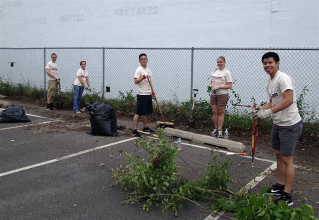 Interns Cleaning Parking Lot