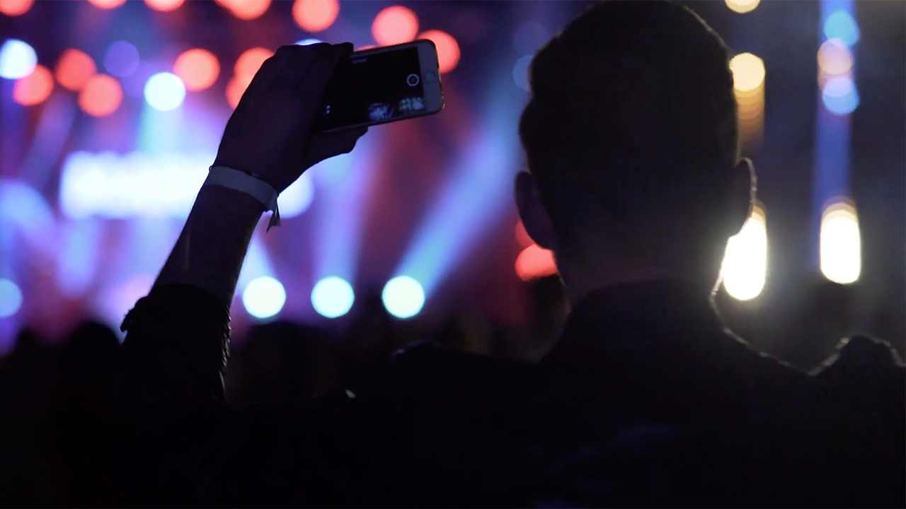 Man dancing at concert video