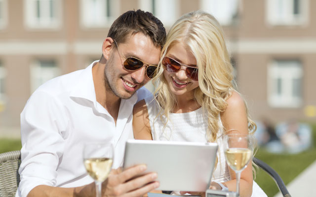 Couple watching a tablet