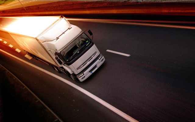 Truck speeding down highway