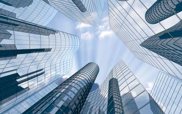 Looking up to the sky among skyscrapers