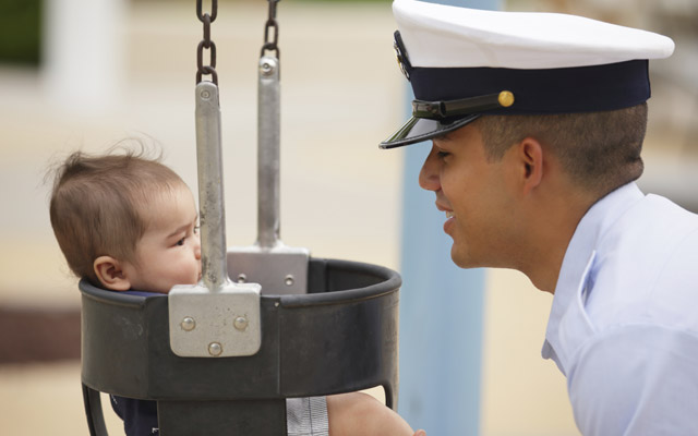 Military Serviceman with child