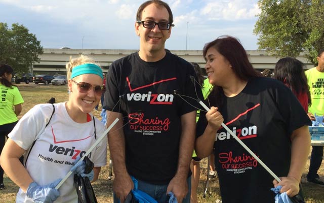 Verizon employees enjoying volunteering time at Don't mess with Texas Trash-Off