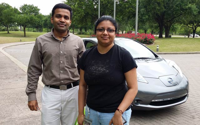 Verizon employees Prasanth Kalvettukuzhiyil and Madhubhashini Dhanabalan test drive the 2015 Nissan Leaf