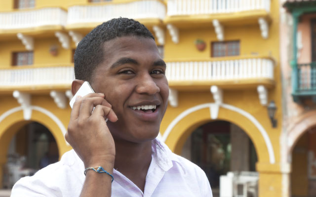 Cuban man on phone