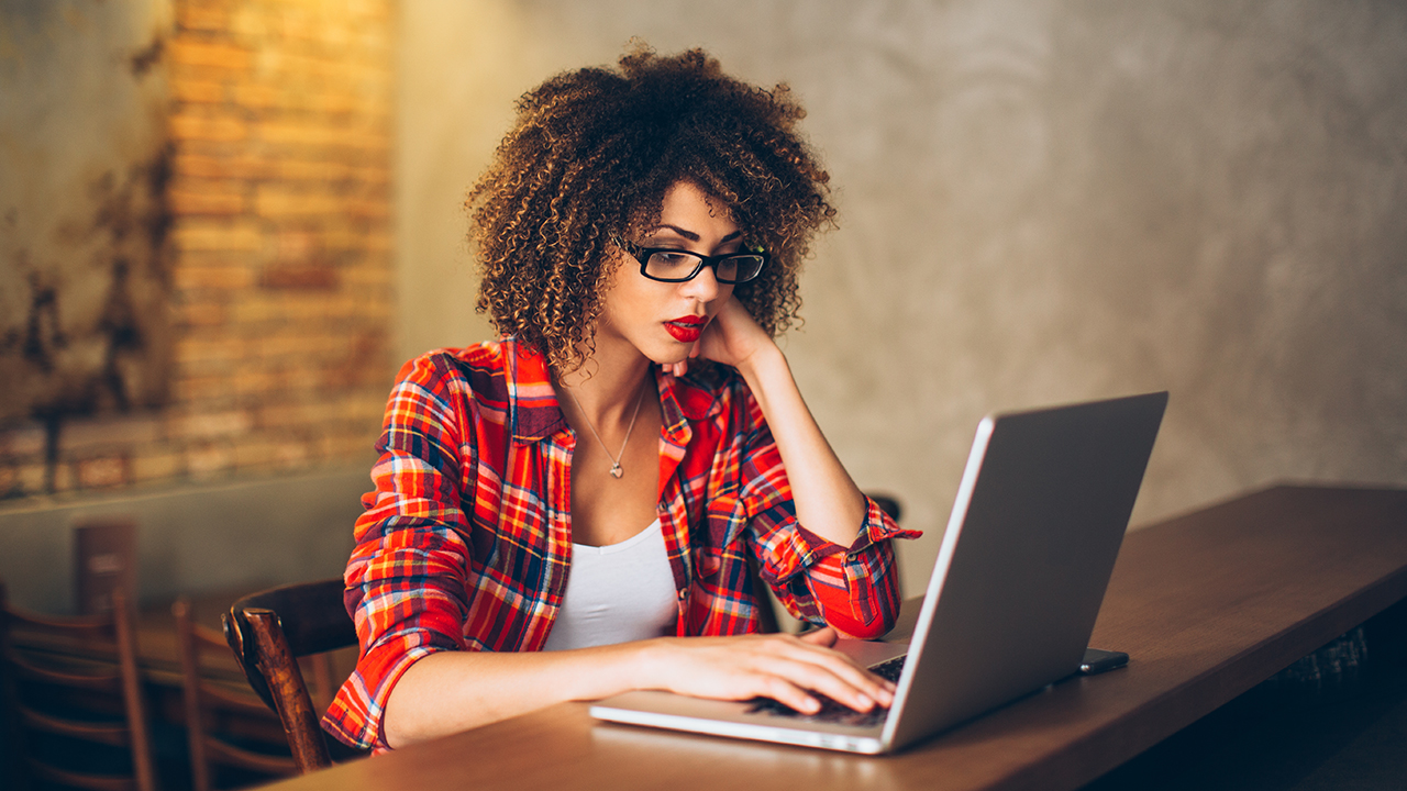 Woman in front of laptop