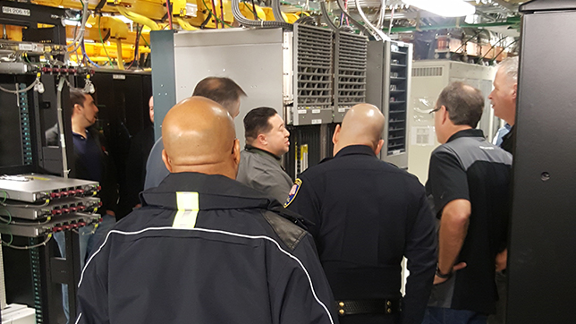 Safety officials get up close and personal with the workings of a wireless switch location