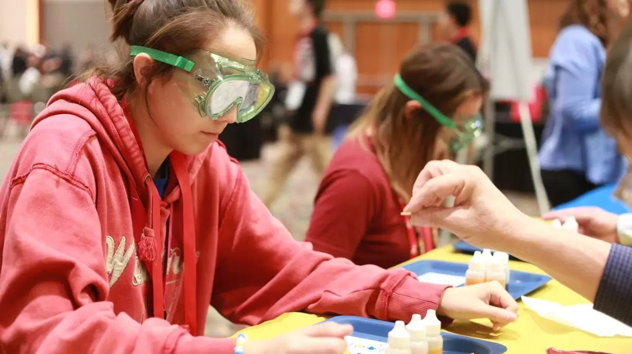 Native American Female Student Doing STEM Experiment