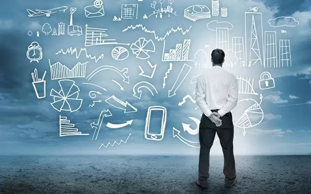 Businessman gazing at cloud options
