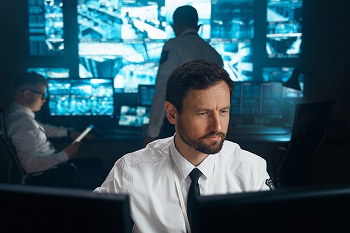 Energy and utilities worker reviewing data on tablet