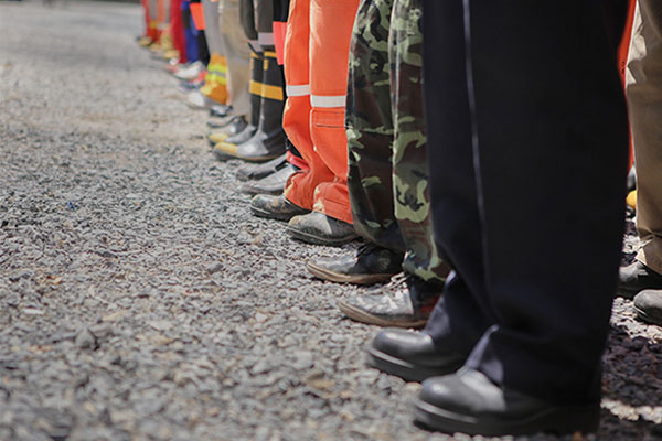 A variety of public safety personnel lined up