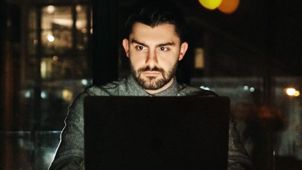 a man with a laptop