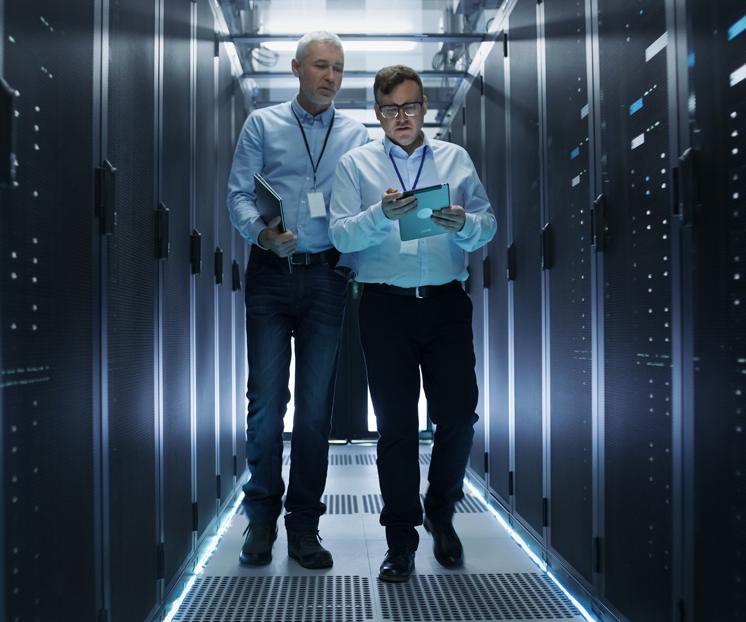 Team walking through network servers