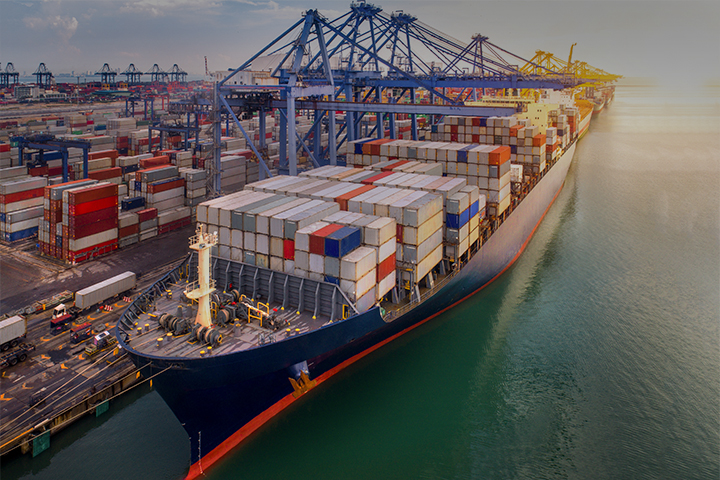 Container ship preparing for transportation at a container port