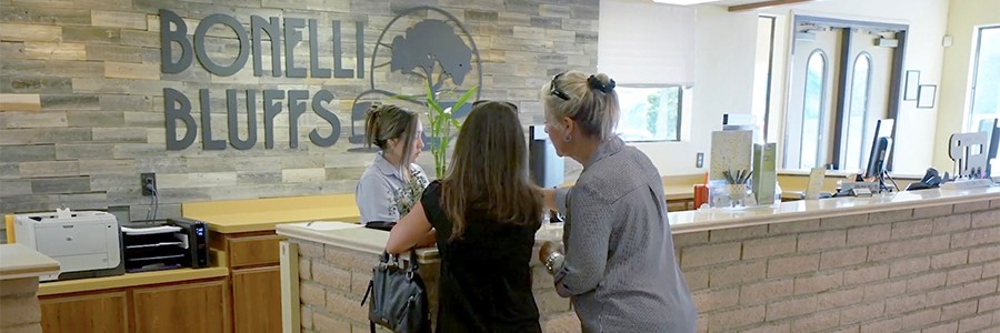 Vista Recreation check-in desk with two customers