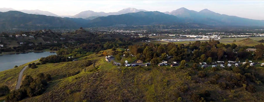 Aerial view of Vista Recreation property near lake and mountains