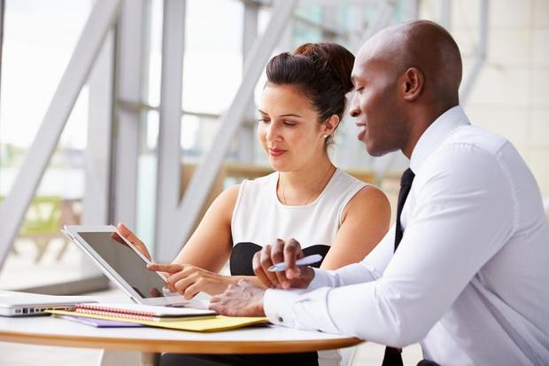 two-people-share-tablet