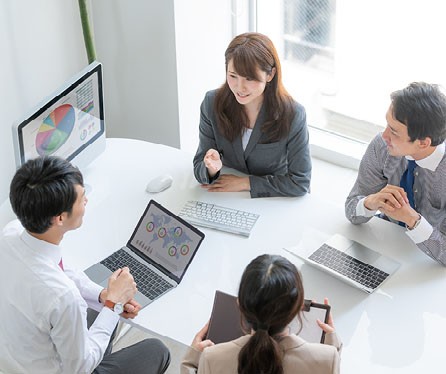 Men and women having a meeting