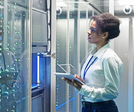 Woman with a tablet in the data room