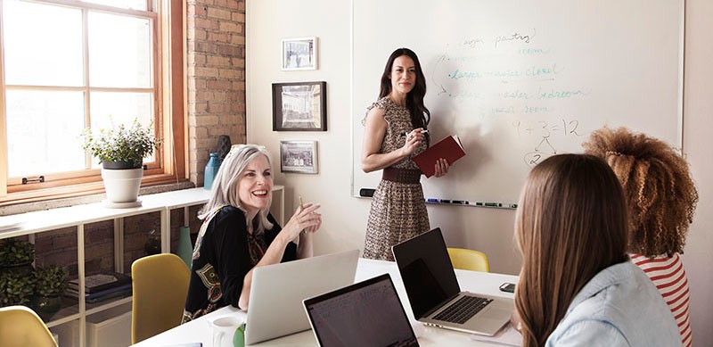 woman at whiteboard short