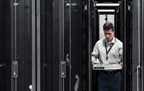man holding server in warehouse