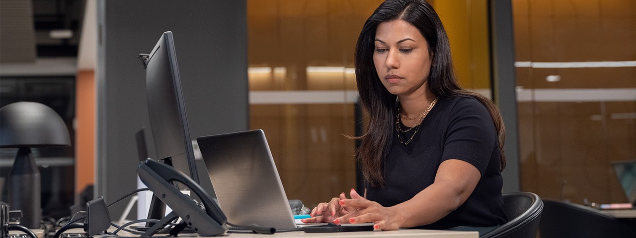 woman IT professional working at a computer