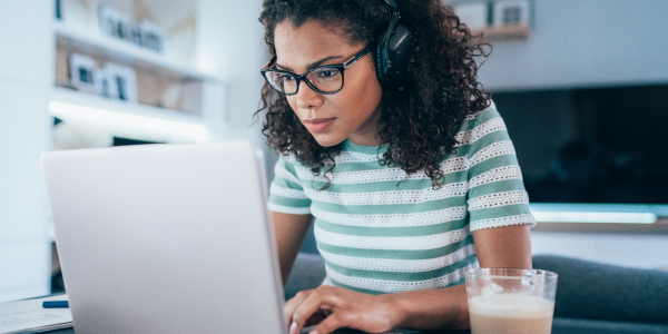 Woman working on her laptop.