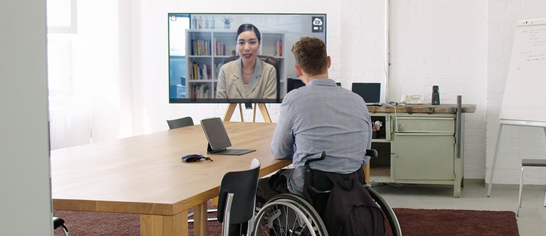 Businessman with disability having a video conference