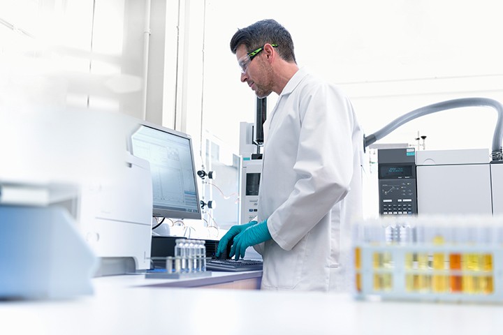 Man in lab using computer
