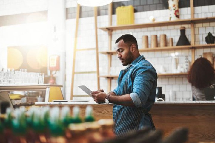 Barista using tablet