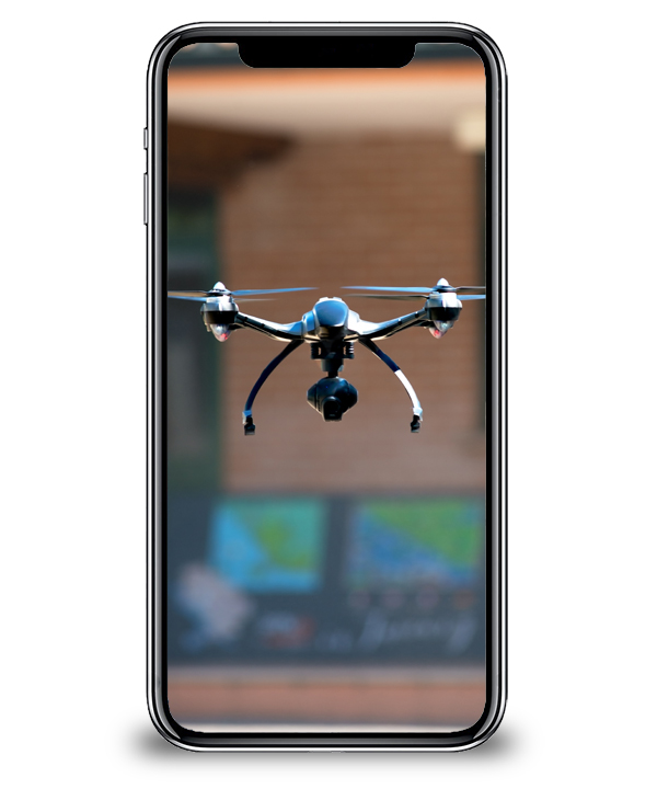 Phone screen with image of drone on it.