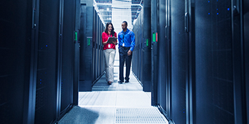 Women and man in data center