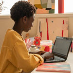 k12 girl on laptop at home xsm