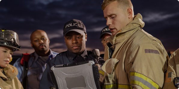 First responders looking at tablet