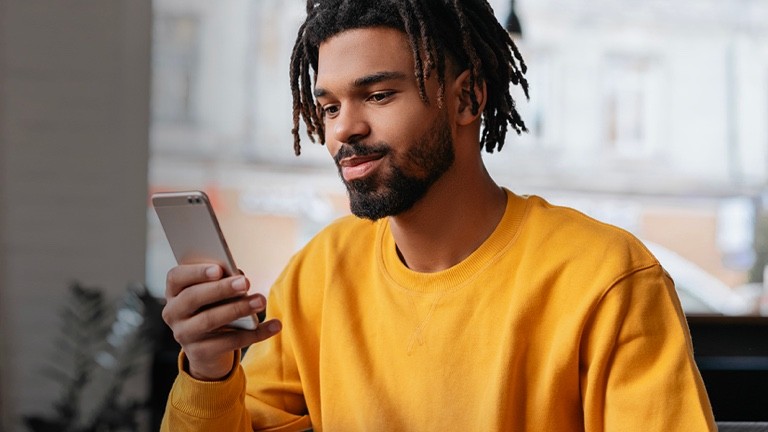 Man with smart device