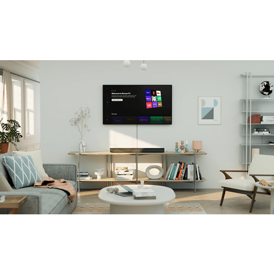 Foto de un televisor sobre una barra de sonido Stream TV en una sala de estar